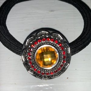 Black stretch bracelet with one snap.  NWOT